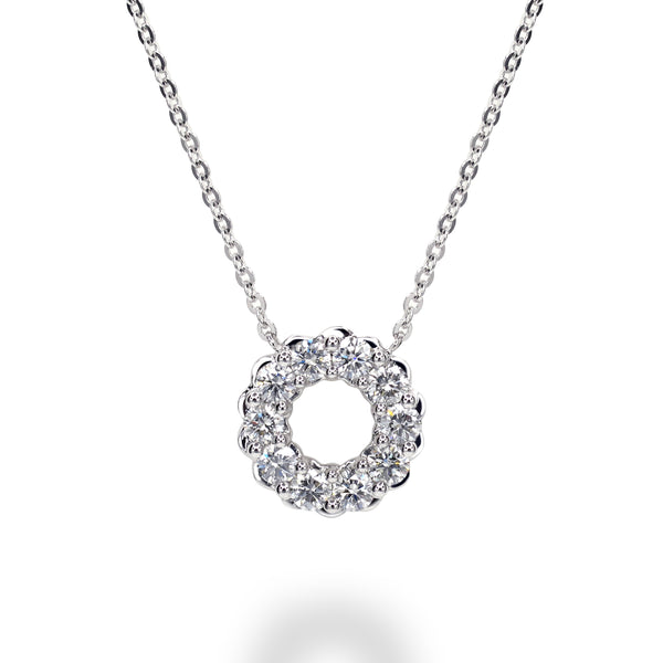 18K gold or platinum necklace with donut-shaped pendant with round brilliant diamonds