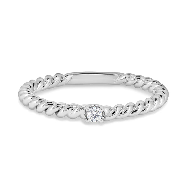 Rope style ring with a diamond centre-stone. Handcrafted in 18K white gold with a round brilliant diamond.